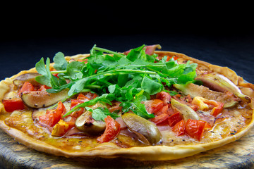 Pizza with figs, prosciutto and mozzarella