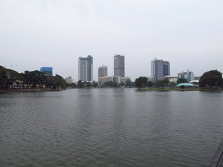 Fototapeta na wymiar The skyscraper in the center of Colombo on Beira lake, Sri Lanka