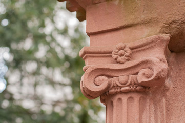 detail of the ionic capital of a sandstone column