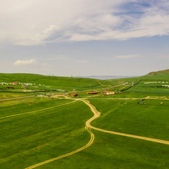 Fototapeta na wymiar Aerial view of the Mongolian countryside, not far from Ulaanbaatar, the capital of Mongolia, circa June 2019
