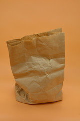 Empty craft paper bag isolated . Mockup for design