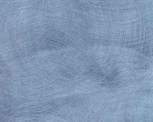 The polished surface of natural gray stone with traces of processing. Close up shot.