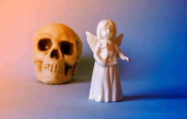 White angel and black skull