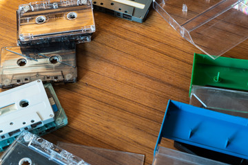Cassette tapes on wood background