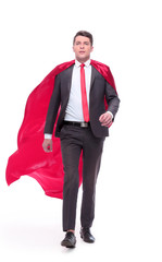 confident businessman in superhero Cape striding forward.