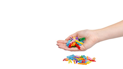 Mini colored clothespins, decoration. Isolated on white.