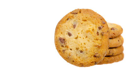 Round cookie with chocolate drops. Isolated on white.