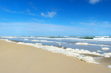 Empty beach with foam