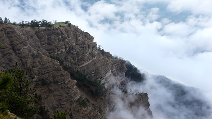 Mountains among the clouds and fog.