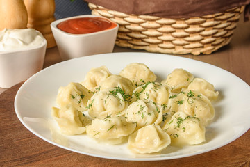 Homemade dumplings - Russian dumplings. Meat dumplings, ravioli. Dumplings with stuffing.