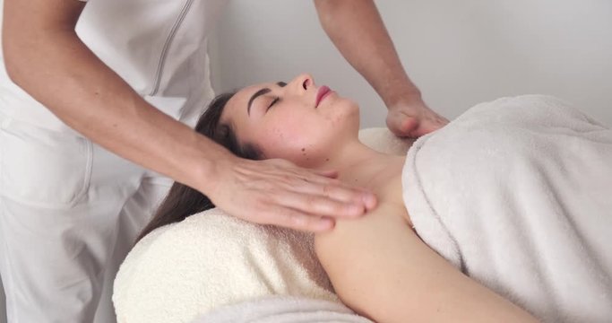 Spanish head massage. relaxing massage for face Massage therapist at Spa salon