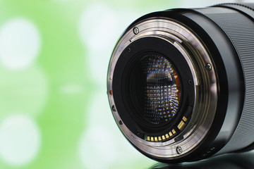 Equipment videographer and photographer. Lenses on the table against the background of bright...