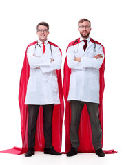 in full growth. two medical workers in superhero capes © ASDF
