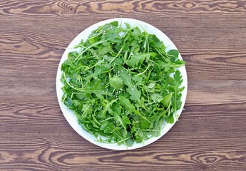 Fresh spring arugula salad - diet healthy food.