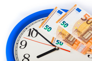 Clock and money euro - business concept