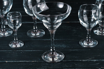 Empty  glasses for drinks on dark background