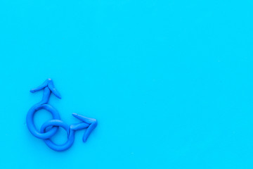 LGBT concept. Male Mars symbol on blue background top-down copy space