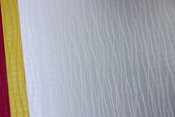 photo of the pattern and texture of the wallpaper surface. Wallpaper colors can change the mood of the room.