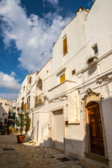 Obraz premium Typical alley in beautiful small town of Cisternino, Apulia, South Italy
