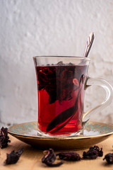 Hot tea, hibiscus tea, place for text.