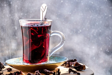 Red tea, hibiscus tea, place for text.
