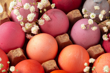 Easter eggs painted in shades of pink close up