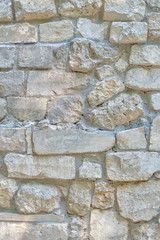 Background of ancient stone wall, masonry made of large rock