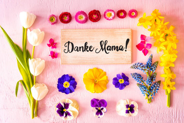 Rustic Wooden Sign With German Calligraphy Danke Mama Means Thank You Mom. Flat Lay With Spring...