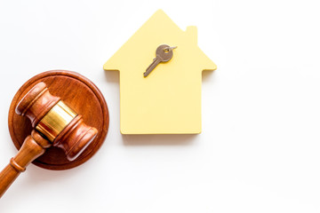 Property auction. Judge gavel near house on white background top-down