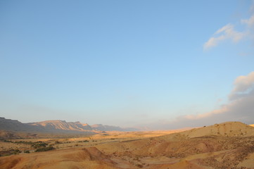 Desert landscape at sunrise. Hiking desert part of Israel National Trail. Negev desert . Valley. Colorful sands 