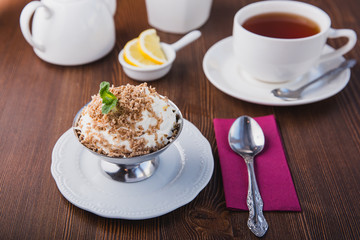 Chestnut puree with whipped cream and chocolate chips for dessert, restaurant menu