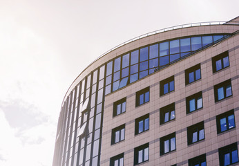 Modern luxury office building on sky background