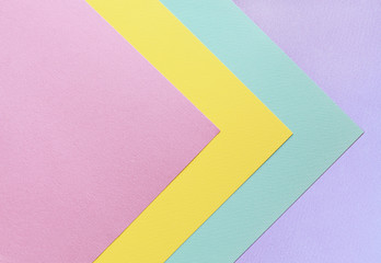 Abstract geometric background in soft pastel trend colors, made from watercolor paper.