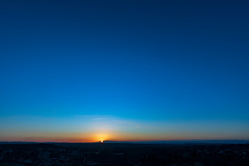 Blue sky and sun down, Auvergne, France.