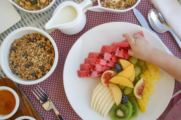Fruit platter and cereals for breakfast, healthy raw organic breakfast option	