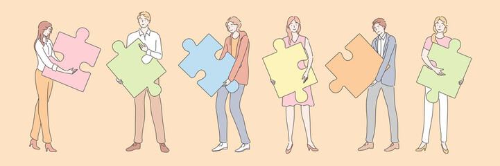 Teamwork, partnership, business cooperation set. Team group of young businesspeople businessmen women with puzzle elements jigsaw together. Symbol of teamwork, collaboration, coworking. Brainstorming