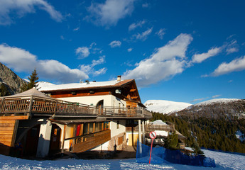 Obraz premium beautiful house in mountains on a sunny day