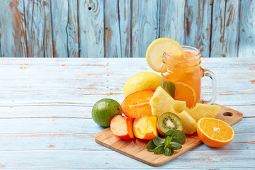 Cold fruit lemonade with ice.