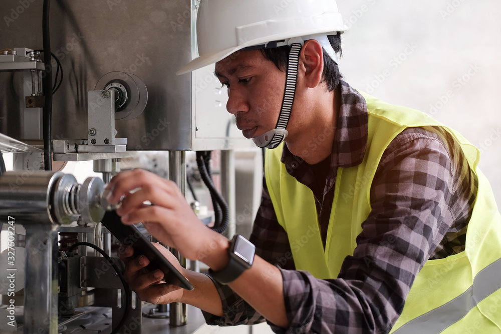 Poster cropped shot view manager technical industrial engineer working and control robotics with monitoring