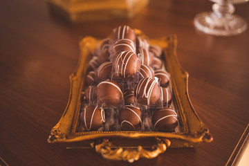 sideboard with fine chocolate party sweets