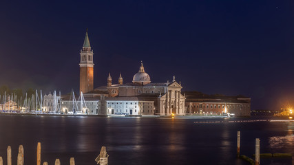 Fototapeta na wymiar Gondolas, Grand Canal and San Giorgio Maggiore Church at night, Venice