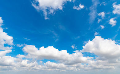 Obraz na płótnie Canvas A blue sky with white clouds