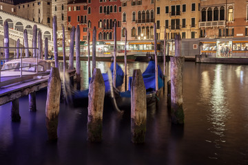Fototapeta na wymiar Grand Canal with gondolas at night, Venice, Italy