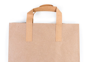 Paper bag upper part with paper handles on white background