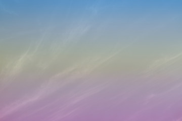 Blurry clounds in the sky with pastel colors.