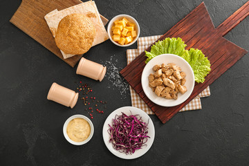 Ingredients for tasty doner kebab on dark background