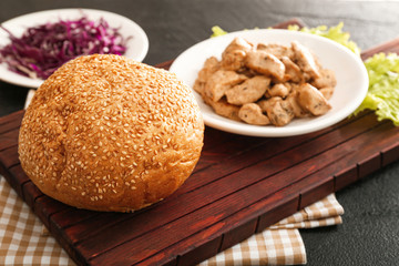Ingredients for tasty doner kebab on dark background