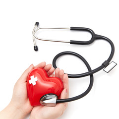 Red heart and stethoscope in both hands