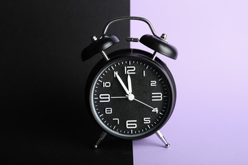 Alarm clock on color background. Time management concept