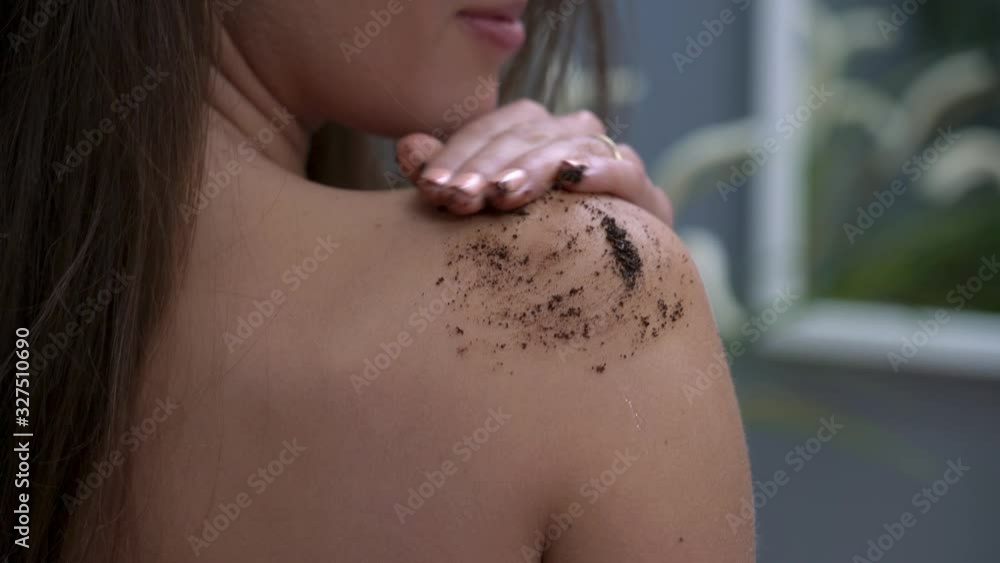 Canvas Prints happy woman applying body scrub in bathroom in the morning